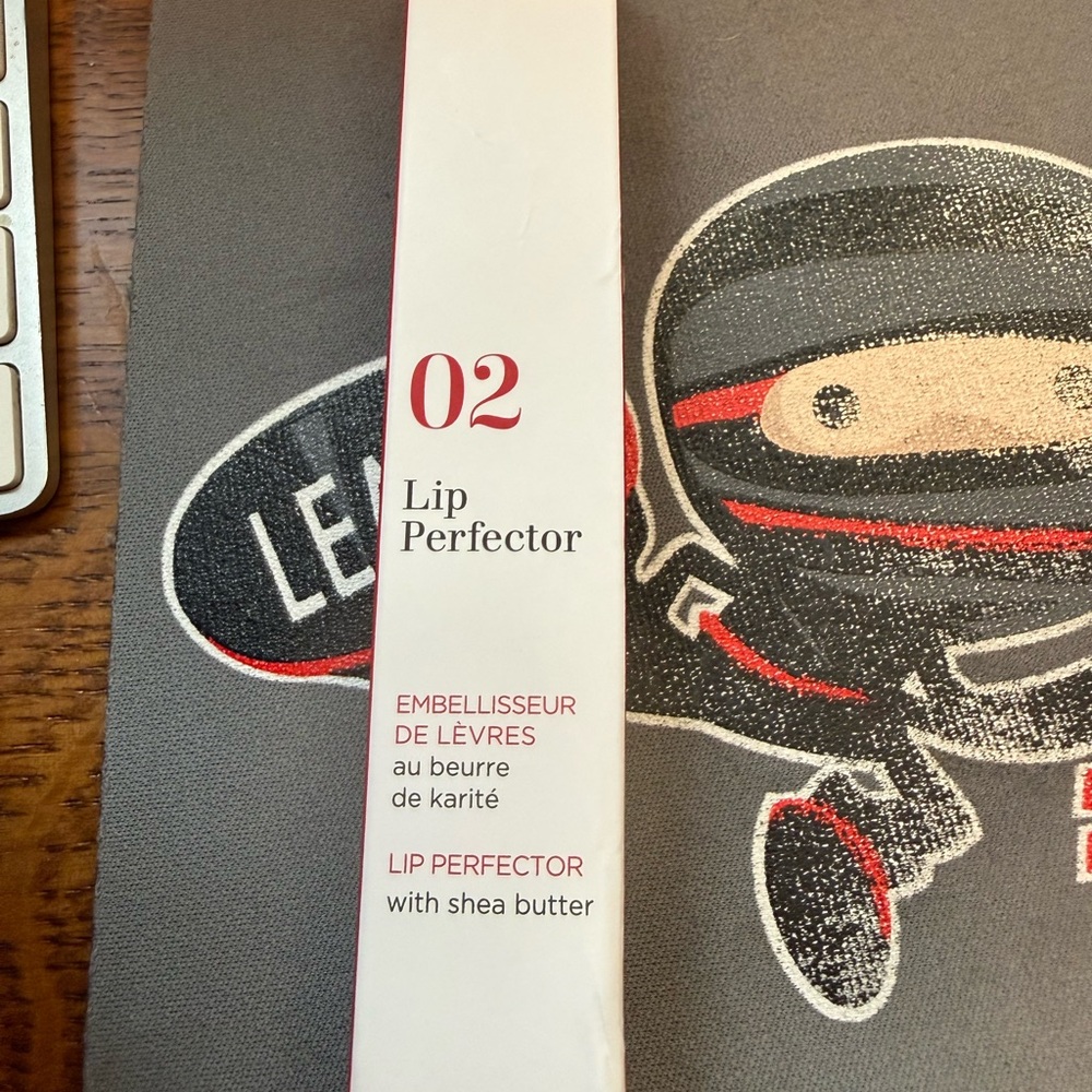 02 Clarins Lip Perfector with Shea Butter - Lip Balm made in France